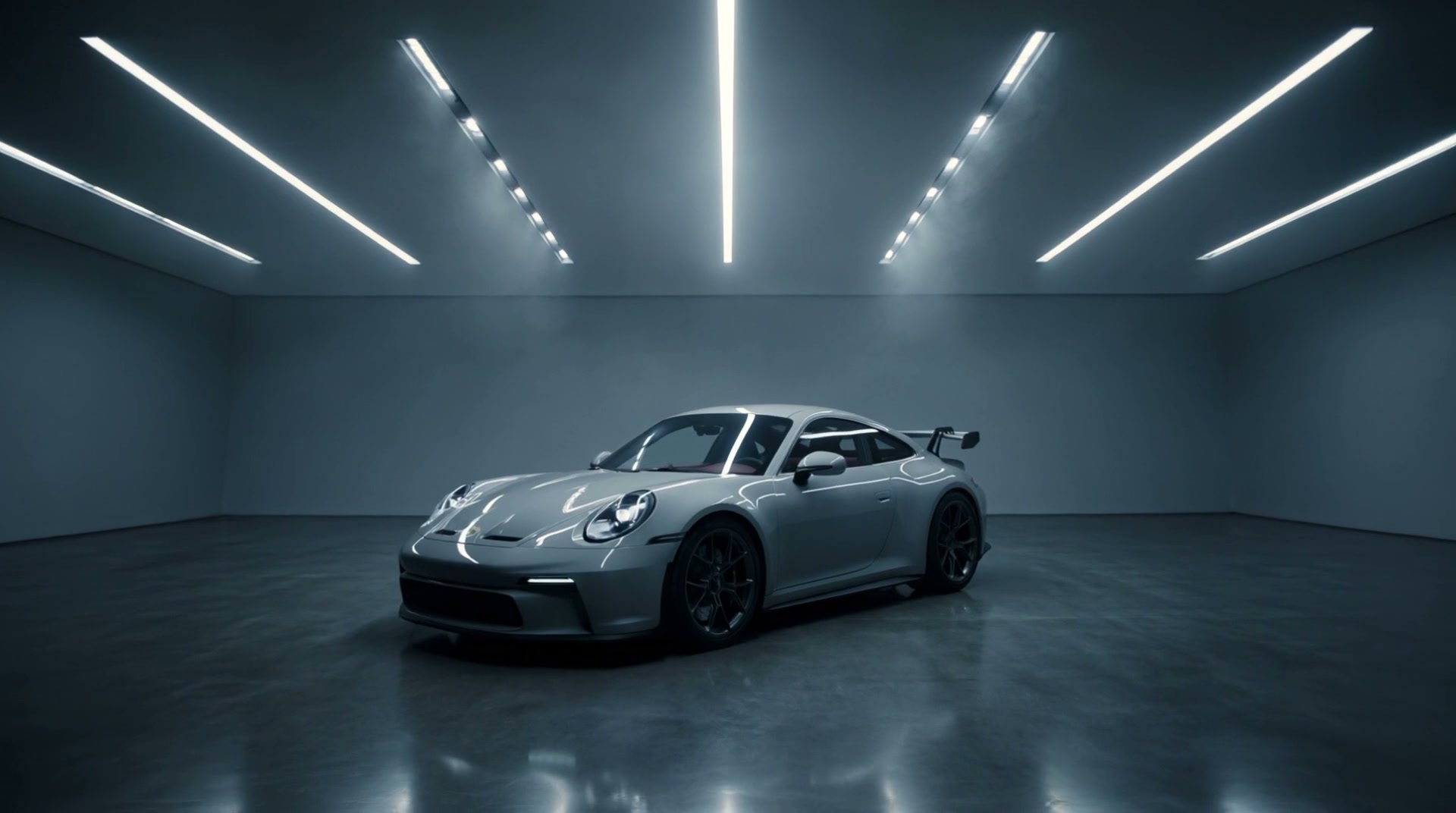 Chalk sports coupe under the showroom lights at G2 Auto Group